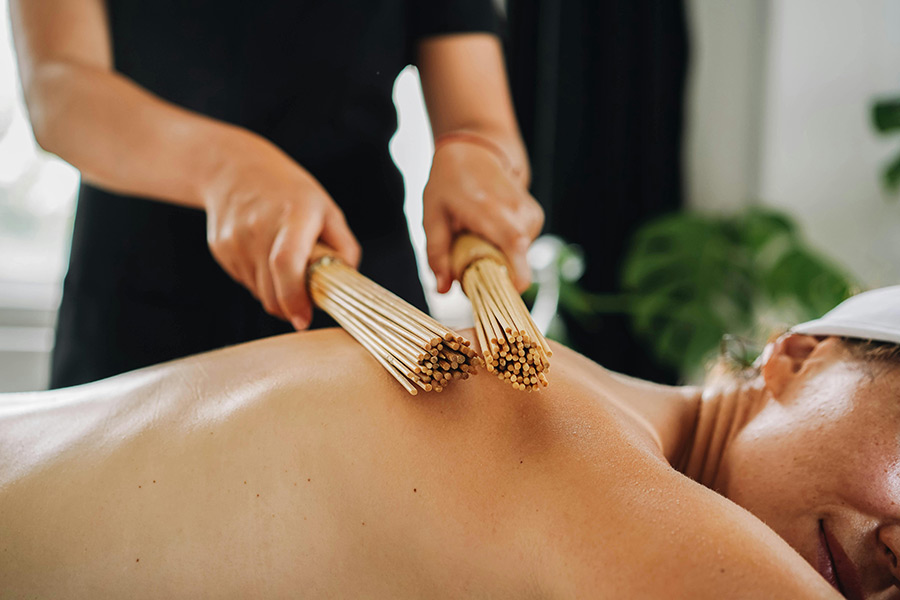 Bamboo-&-Stick-Massage Bamboo & Stick Massage performed on a woman