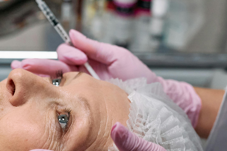 Botox-injection Woman receiving Botox injection
